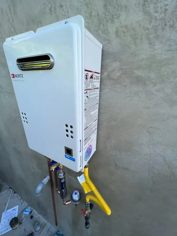 Tankless water heater installation for Camelot homes